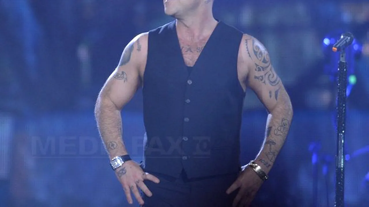 Robbie Williams se întoarce în studio alături de Take That, trupa care l-a făcut celebru