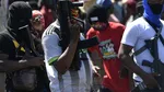 Violențe și ciocniri cu poliția ale grupărilor criminale în Port-au-Prince, în timp ce guvernul haitian se reunește