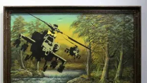 Două picturi semnate de Banksy, aflate în colecţia lui Robbie Williams, vândute pentru o sumă record 