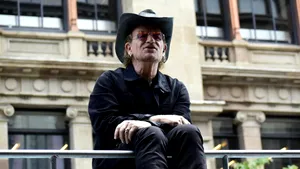 U2 s-a întors la școală. Bono și colegii săi au cântat pentru elevi în locul unde trupa s-a format acum 50 de ani
