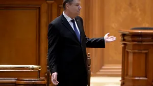 Iohannis atacă la CCR legea privind alocarea a 1% din taxele jocurilor de noroc pentru COSR