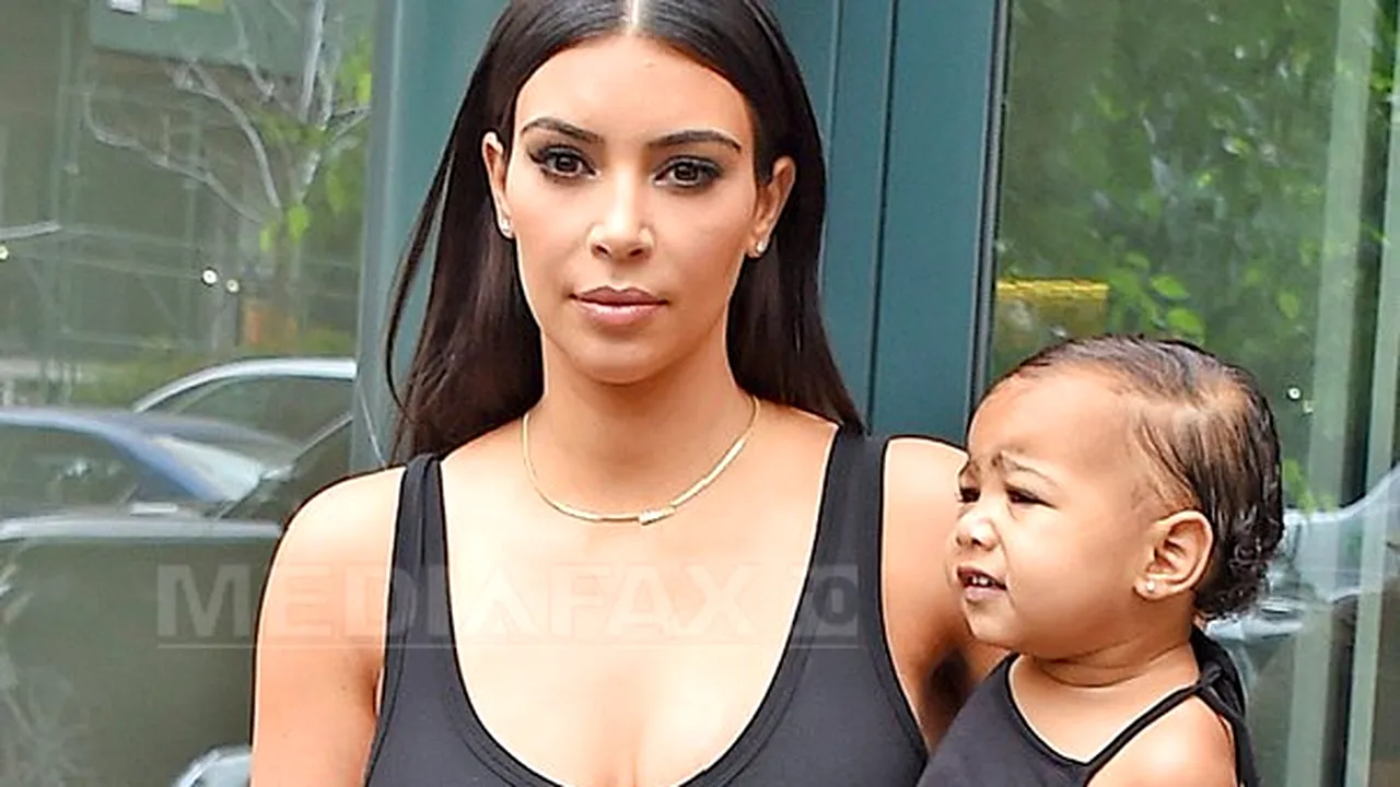 Fiica starletei Kim Kardashian şi a rapperului Kanye West a debutat ca model, la doar 13 luni - FOTO