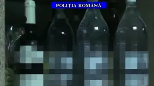 Percheziţii la firme care au vândut vin de masă obţinut din amestec de alcool, arome şi coloranţi. 17 persoane, audiate. Peste 3,6 tone de vin, găsite la percheziţii - VIDEO