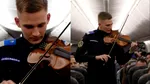 Un jandarm român a interpretat imnul României în avion, la peste 10.000 de metri altitudine