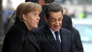 Germania şi Franţa vor să forţeze Portugalia să ceară ajutor financiar european