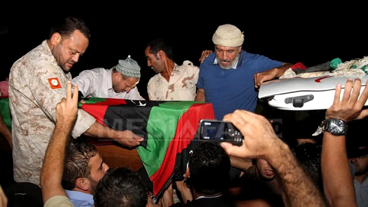 Unul dintre rebelii libieni care l-au capturat pe Muammar Kadhafi a murit 