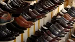 Lanţ de comerţ cu încălţăminte amendat pentru muncă „la gri”: normă parţială doar în acte
