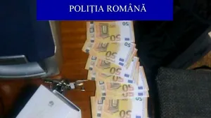 Un tânăr din Satu Mare ar fi falsificat bancnote de 50 de euro şi făcea cumpărături seara, ca să îi înşele pe vânzători