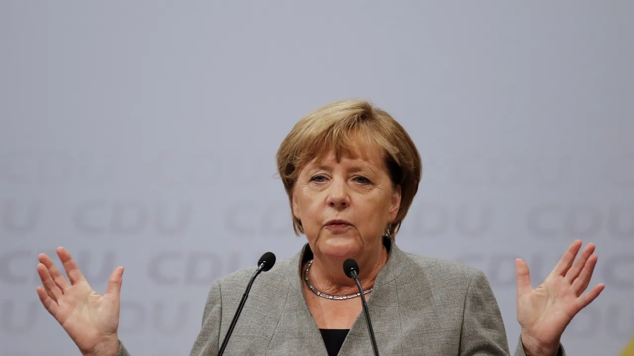 Angela Merkel a criticat protestatarii care i-au boicotat discursul la un eveniment electoral