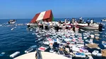 Captură neobișnuită în Strâmtoarea Ormuz: Iranienii pescuiesc iPhone-uri și parfumuri de lux