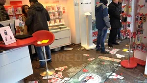 Alte două persoane arestate pentru jaf din sediul unei societăţi de telefonie, în timpul protestelor