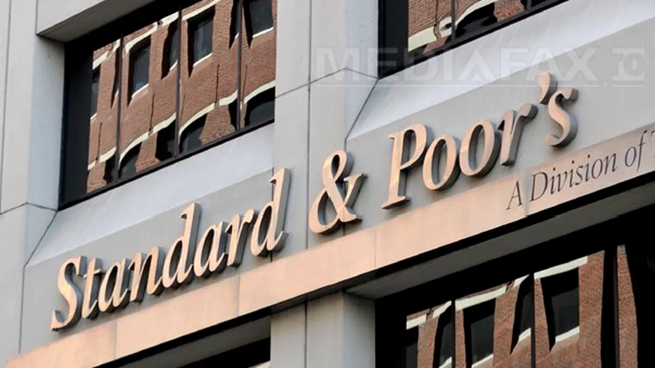S&P a retrogradat 11 bănci spaniole în urma reducerii ratingului de ţară