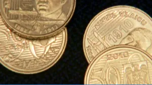Vezi cum arată noua monedă de 50 de bani - VIDEO