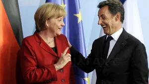 Sarkozy şi Merkel, personaje la un carnaval din Portugalia care parodiază criza economică