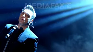 Robbie Williams a sosit în România