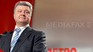 Poroşenko o îndeamnă pe Merkel să-l ajute să soluţioneze conflictul din estul Ucrainei