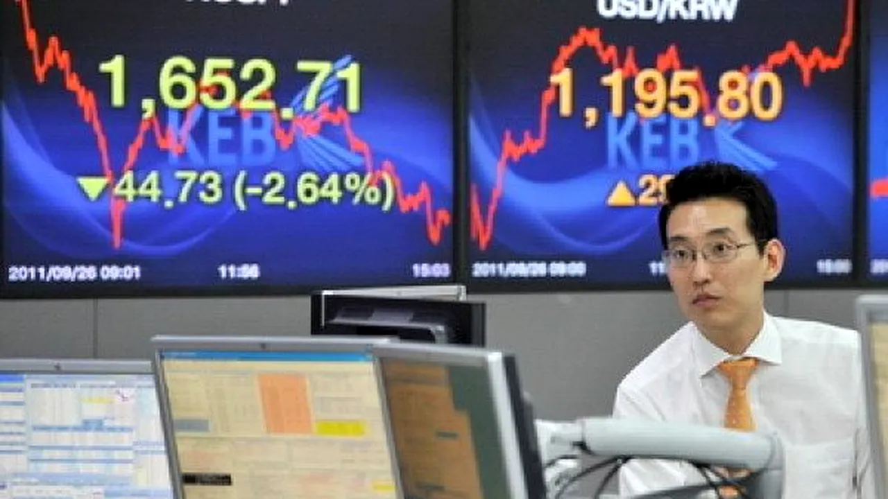 Bursele asiatice se redresează, iar cele americane scad pentru a doua zi 