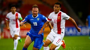 China a învins Uzbekistan cu 2-1 şi s-a calificat în sferturile de finală ale Cupei Asiei
