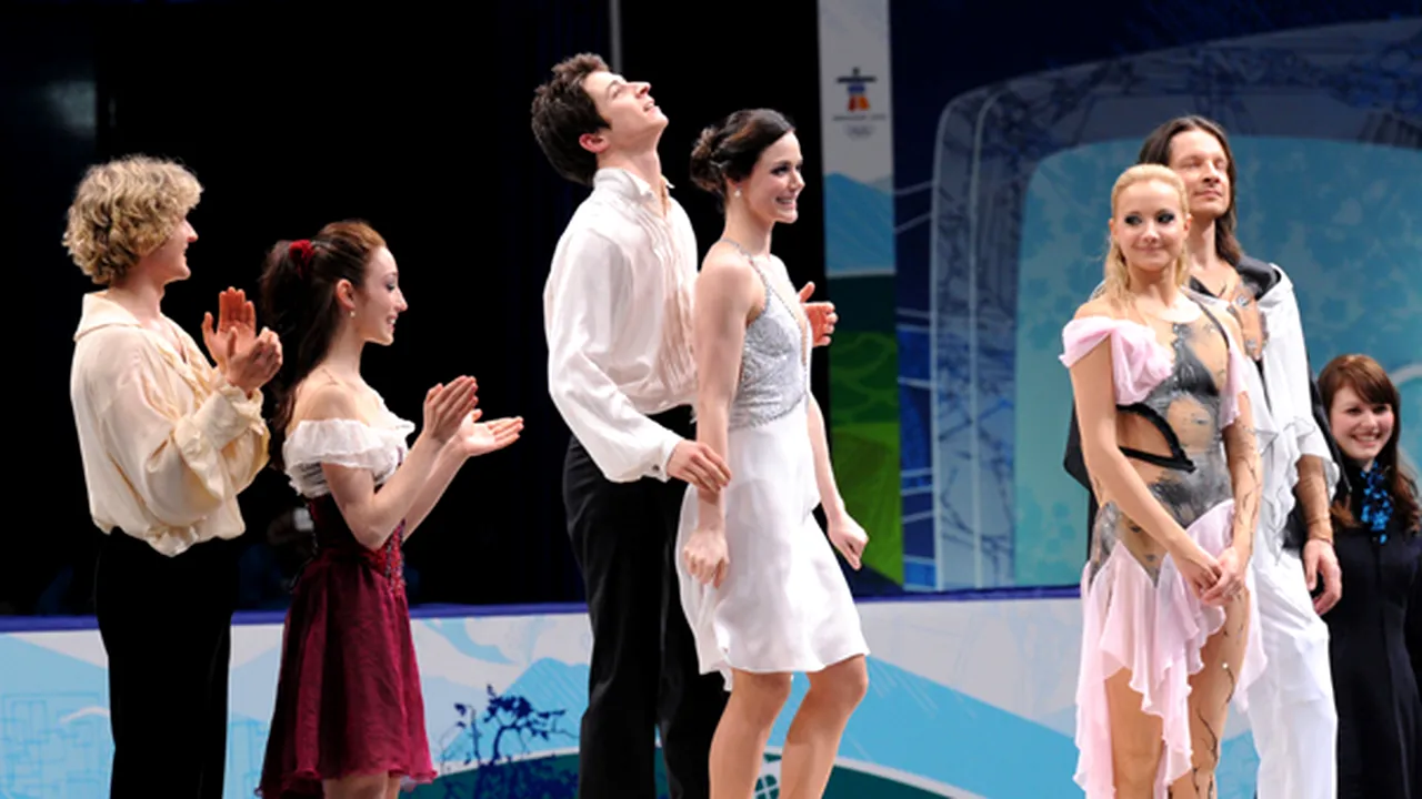 Canadienii Tessa Virtue şi Scott Moir au câştigat titlul olimpic în proba de dans - GALERIE FOTO