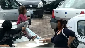 Imagini cu un copil fumând au apărut pe internet. Fetiţa era învăţată de persoanele adulte cum să procedeze. Protecţia Copilului s-a autosesizat