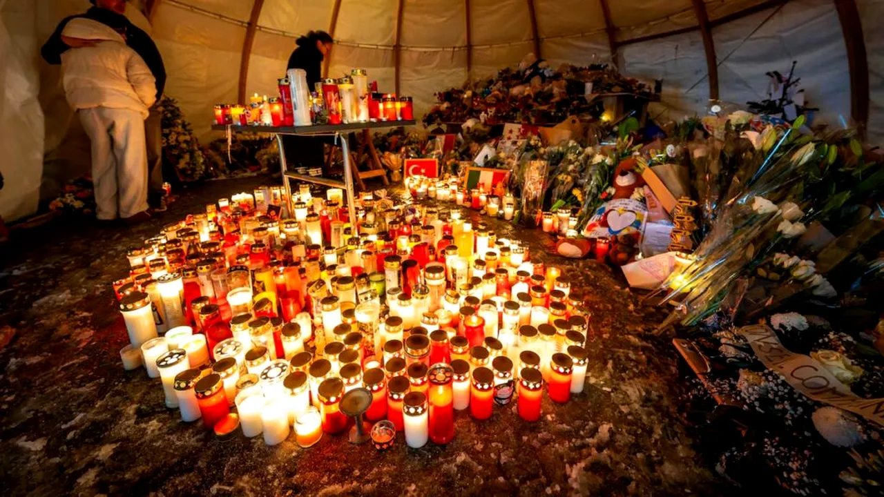 Altarul improvizat pentru victimele tragediei din Elveția a fost cuprins de flăcări
