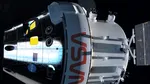 Capsula Orion, cu cei patru astronauți care au plecat spre Lună, văzută de pe o terasă din București