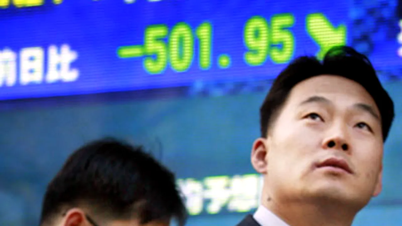 Wall Street şi bursa de la Tokyo au scăzut puternic joi