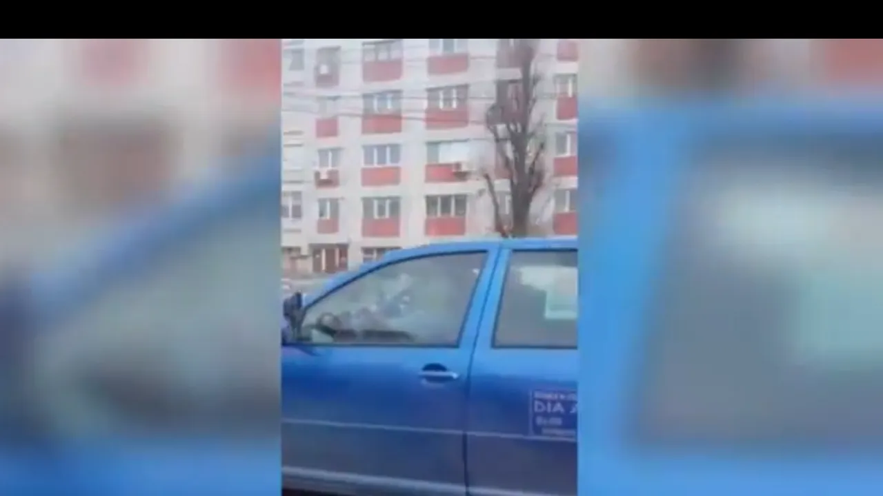 Bărbat filmat în timp ce conducea maşina de pe scaunul din dreapta