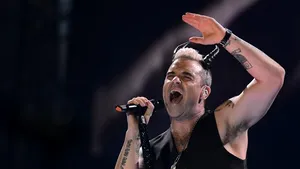 Robbie Williams, mesaj pentru România: Sunt foarte, foarte entuziasmat de concertul de la Bucureşti. De abia aştept să cânt - VIDEO