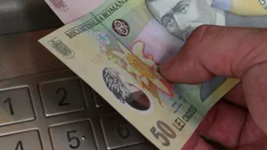 Moneda naţională s-a depreciat joi la 3,55 lei/euro