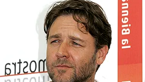 Russell Crowe vrea să fie botezat