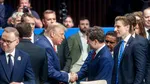 Nicușor Dan, scurtă discuție cu Donald Trump la summitul NATO