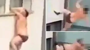 VIDEO: Momentul când un bărbat, posibil surprins de partenerul femeii cu care era, cade de la fereastra unui bloc