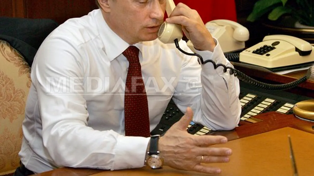 Putin, Hollande şi Merkel au discutat la telefon despre negocierile de la Minsk