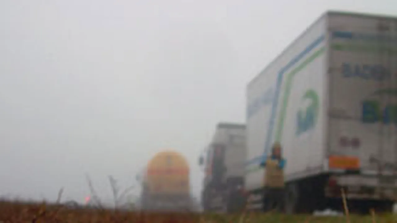 Thick Fog Renders Romanian Traffic Bulky