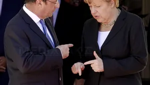 Parisul şi Berlinul îi îndeamnă pe Putin şi Poroşenko să coopereze pentru respectarea armistiţiului