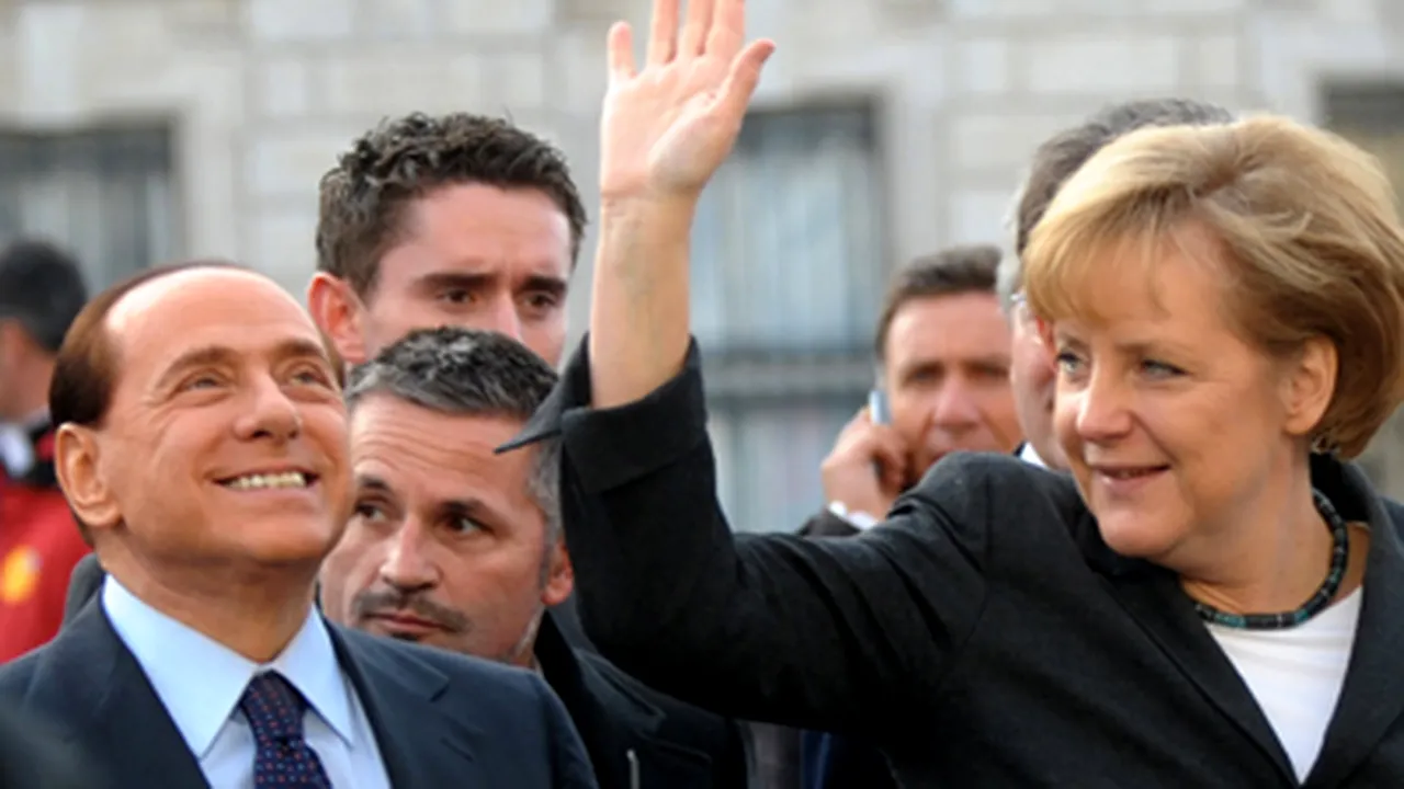 Berlusconi s-a ascuns după un stâlp pentru a o speria pe Angela Merkel (Video)