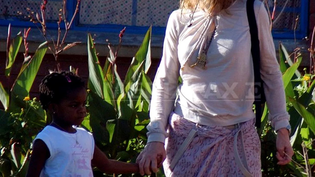 Madonna refuză ca fiica sa adoptată din Malawi să fie văzută de presupusul ei tată