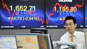 Bursele asiatice se redresează, iar cele americane scad pentru a doua zi 