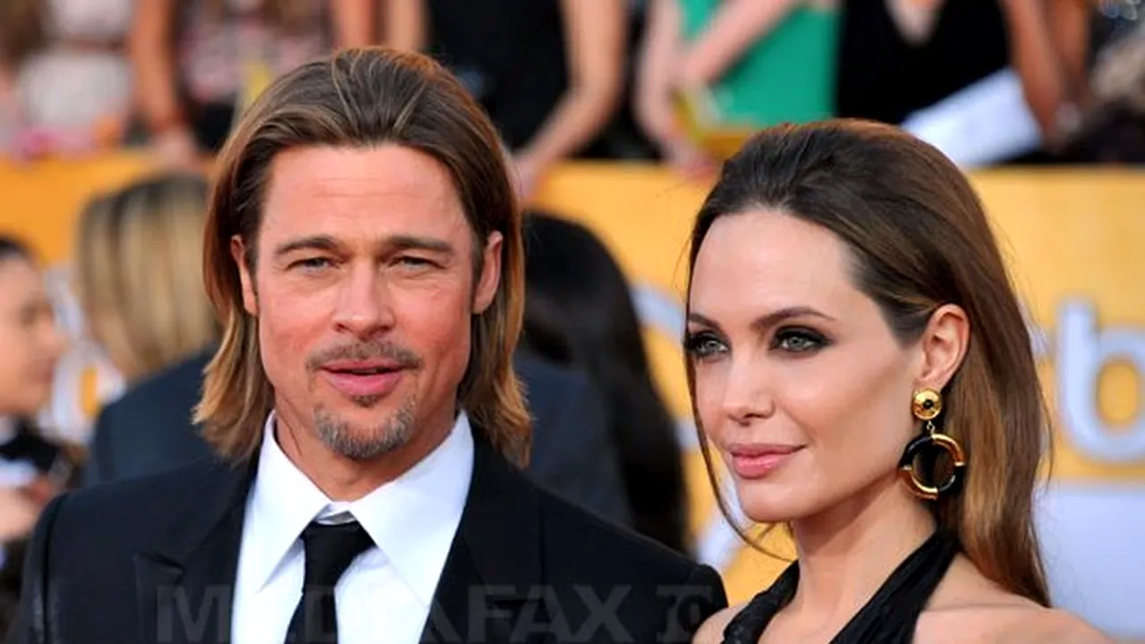 Brad Pitt şi Angelina Jolie s-au sărutat pe covorul roşu - FOTO