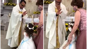 VIDEO Hohote de râs în biserică, după ce un copil a interpretat greşit gestul de binecuvântare al preotului