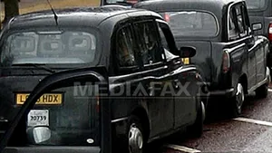 Existenţa taxiurilor negre din Londra, pusă în pericol de aplicaţia Uber: 